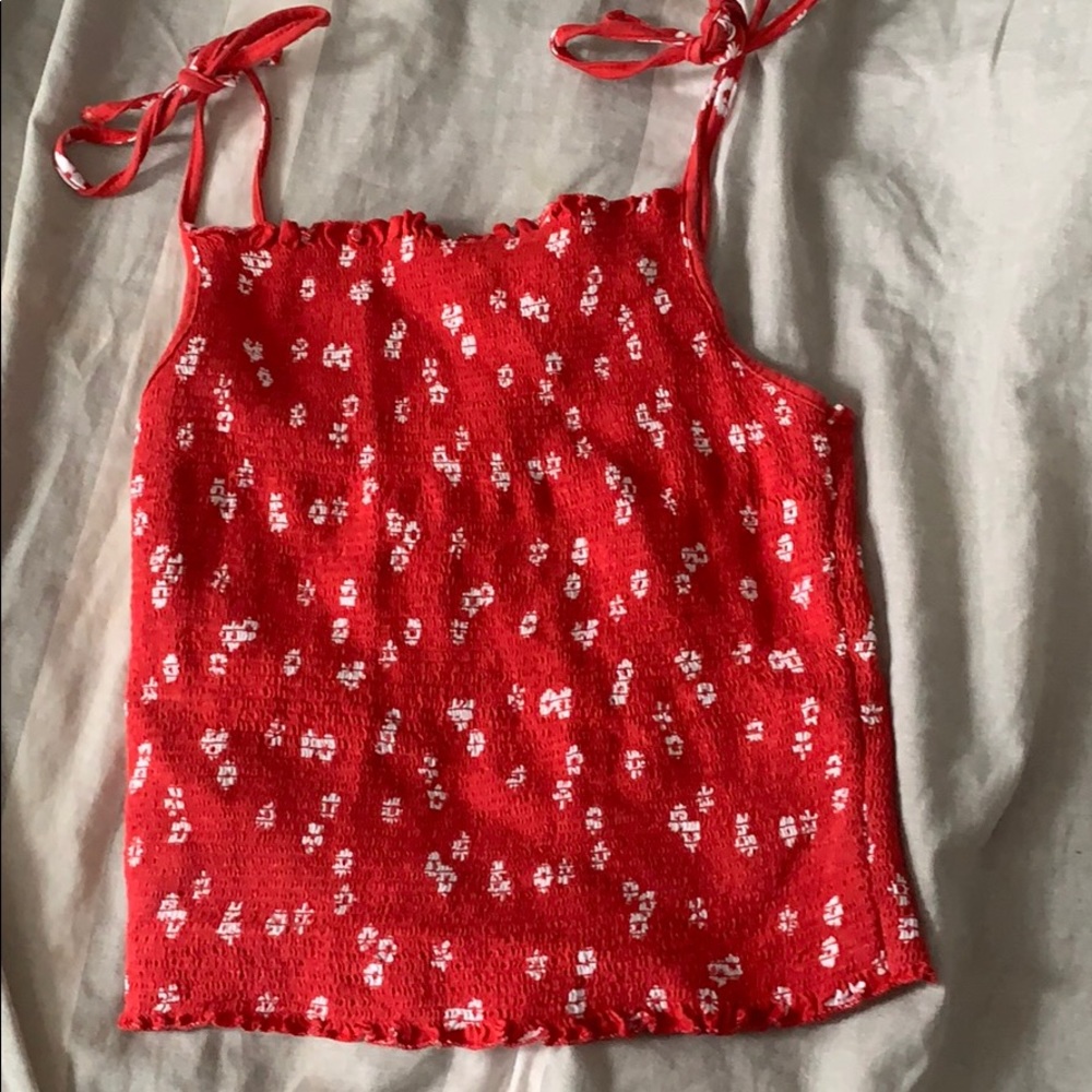 red crop top with white flowers